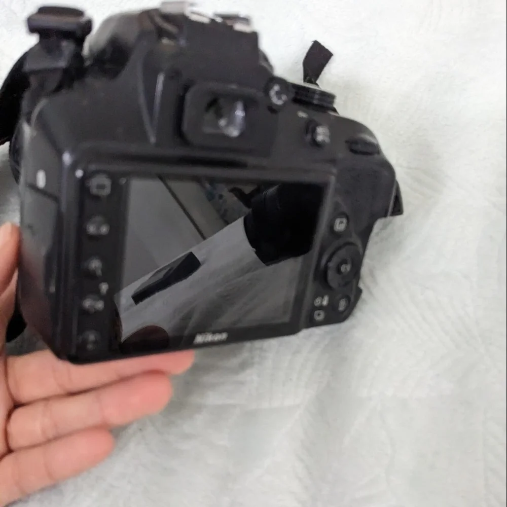 Nikon Black DSLR Camera with Lens
